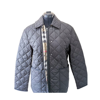 Front view of Burberry Dalry quilted jacket in black with classic silhouette