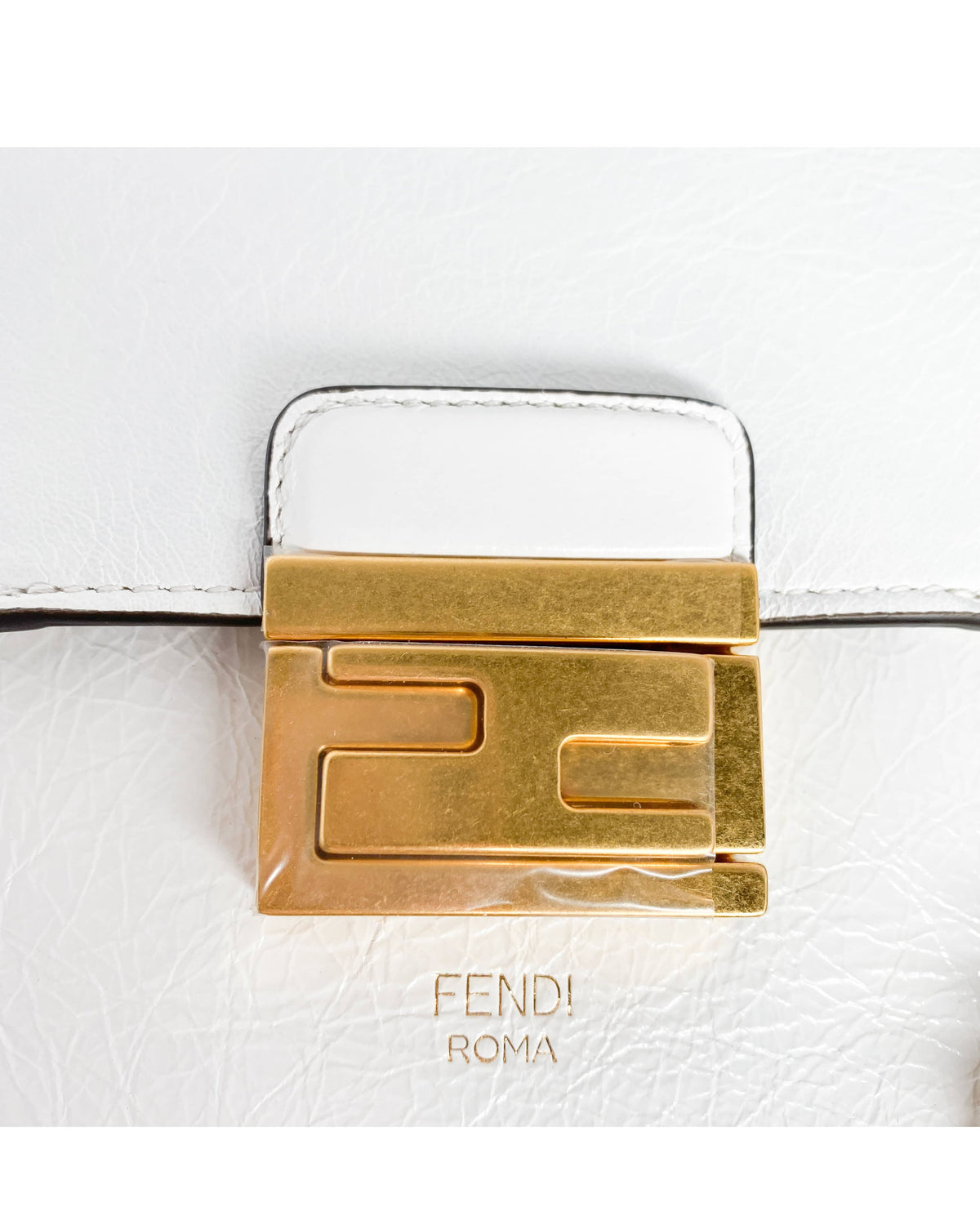 Detail view of Fendi Kan U shoulder bag in white with clean design