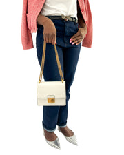 Fendi Kan U shoulder bag in white styled with elegant outfit
