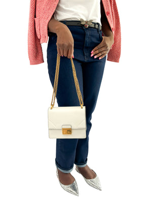 Fendi Kan U shoulder bag in white styled with elegant outfit