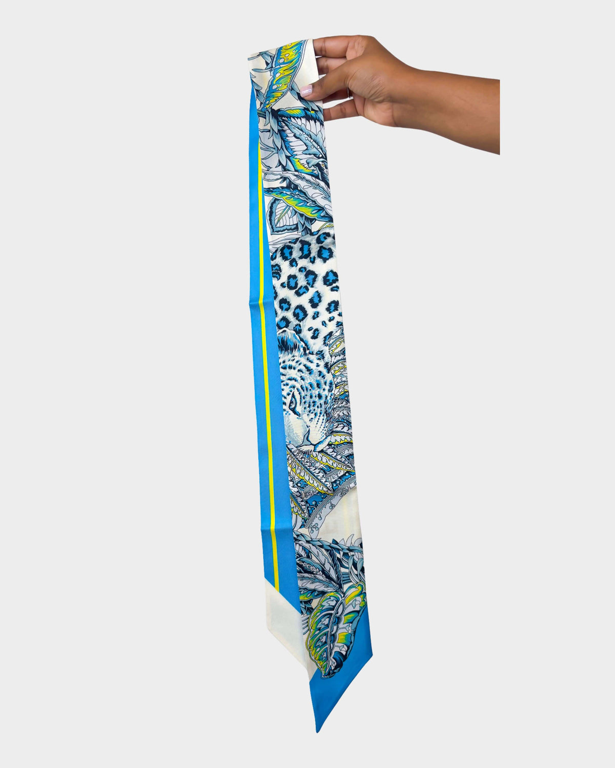 Slim Ferragamo silk bandeau scarf featuring cheetah print design and tapered ends.