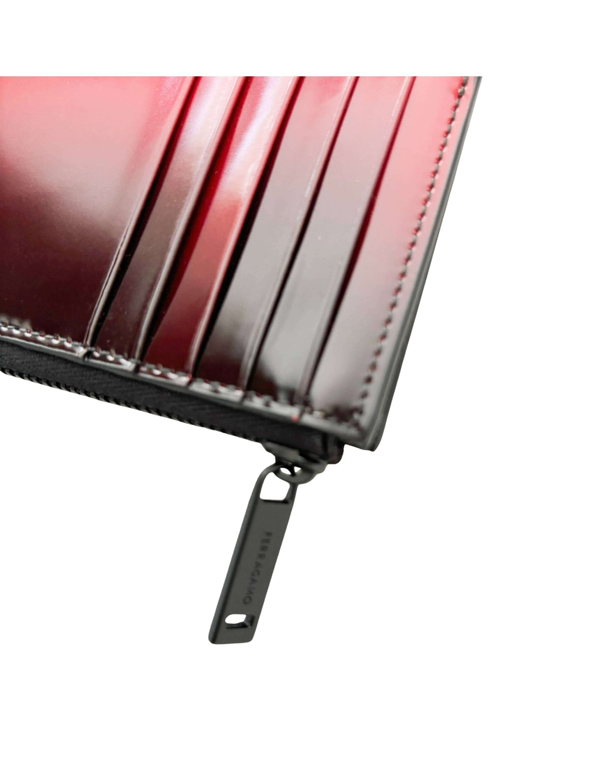 Ferragamo men's two-tone leather card holder featuring secure top zip fastening.