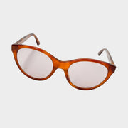 Front view of Gucci women's cat-eye sunglasses in light brown acetate with gradient lenses