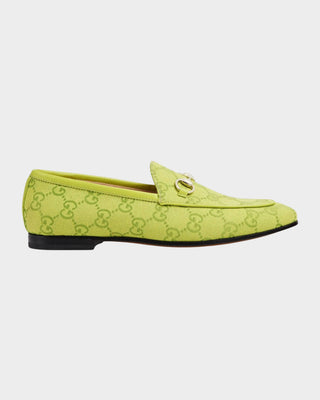 Side view of Gucci pistachio GG canvas loafers with classic silhouette