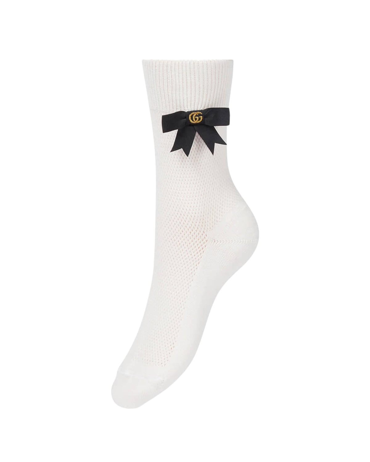 Close-up view of the white Gucci cotton sock showcasing the delicate black grosgrain bow and gold GG logo embellishment.