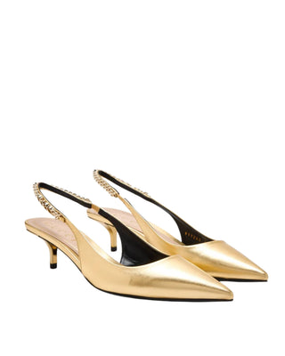 Gucci gold slingback pumps with refined sculpted heel.