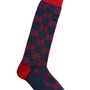 Side profile view of the Gucci navy and red GG long sock showing the heel turn and mid-calf fit.