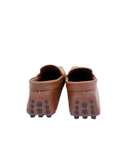 Back view of Gucci driver moccasins showcasing brown leather heel counters and driver rubber sole wrap.