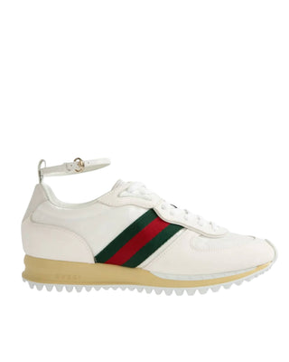 Side profile of Gucci Re-Motion white sneakers