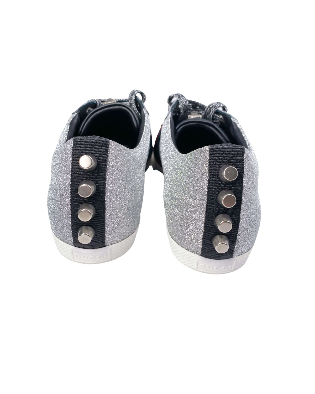 Back view of Gucci trainers in silver showing heel detail