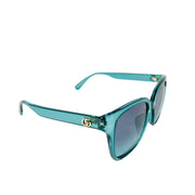 Three-quarter side angle of the turquoise Gucci sunglasses, showcasing the temple arm design and frame structure.
