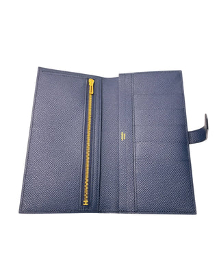 Interior view of Hermès Bearn Soufflet wallet in blue indigo with card slots and compartments