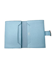 Open interior layout view of Hermès Bearn Small Wallet in Blue Zephyr displaying card slots and inner bill compartments.