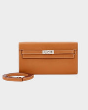 Hermès Kelly-To-Go wallet in Gold Epsom leather with palladium hardware and signature Kelly turn-lock closure.