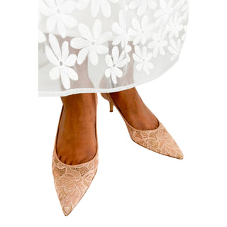 Jimmy Choo Aza 30 powder pink lace kitten heels styled on foot with elegant outfit