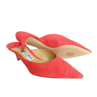 Top view of Jimmy Choo Dovey 50 Pink Suede Mules showcasing sleek contours and elegant shape