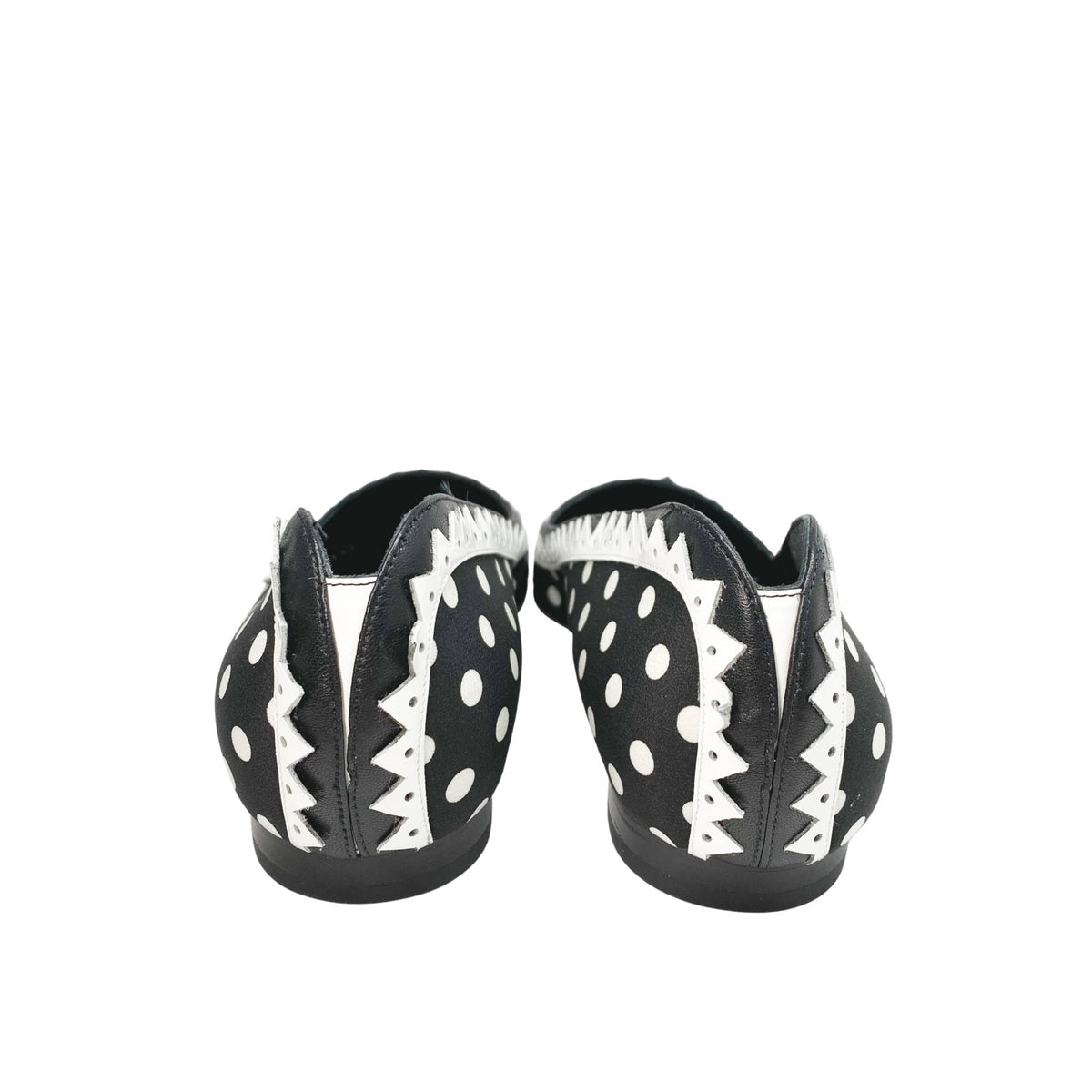 Rear view of the Manolo Blahnik Elaphiria black and white patterned flats highlighting the minimalist flat heel design.