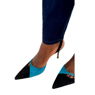 Manolo Blahnik Fenco 70 luxury designer mid heel sling-back heels worn by a model