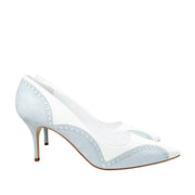 Side profile view highlighting the graceful 70mm mid heel curve and refined silhouette of the Manolo Blahnik Minisia 70 leather pump.