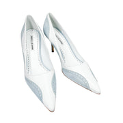 Overhead front view of a pair of Manolo Blahnik Minisia 70 white and light blue lace-overlay pumps displaying the sleek pointed toe box.