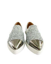 Front view of Miu Miu pointed toe sneakers showing silver metal toe cap and sparkle detail