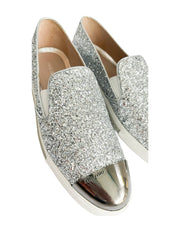 Close-up of Miu Miu round toe sneakers showing silver metal toe cap and sparkle detail