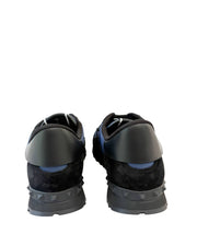 Back view of navy Valentino Rockrunner sneakers showing black heel counters and studded rubber clips.