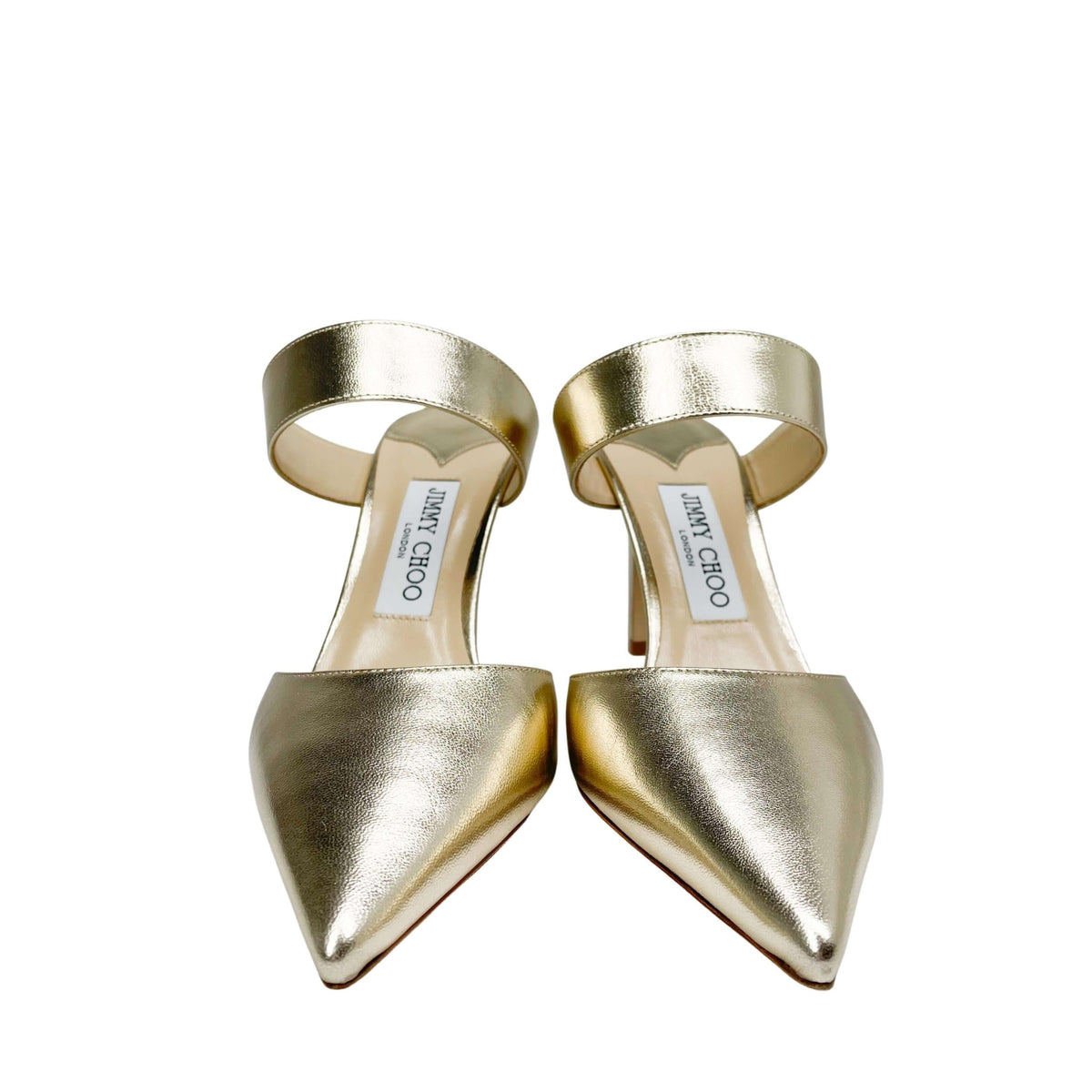 Direct front pair view of Jimmy Choo Cheri 85 metallic gold pointed-toe pumps displayed on a white studio background.